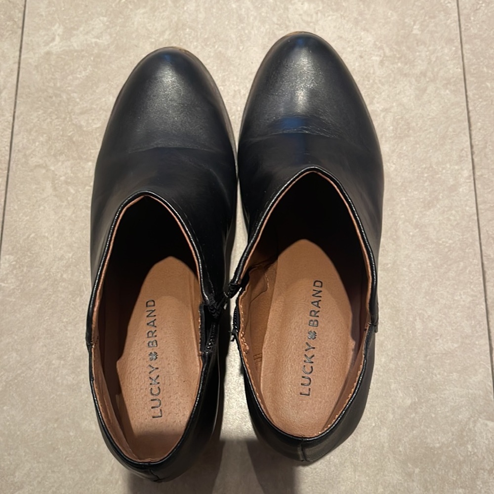 Barely worn short 6.5.  Lucky booties with low heels. Great condition.